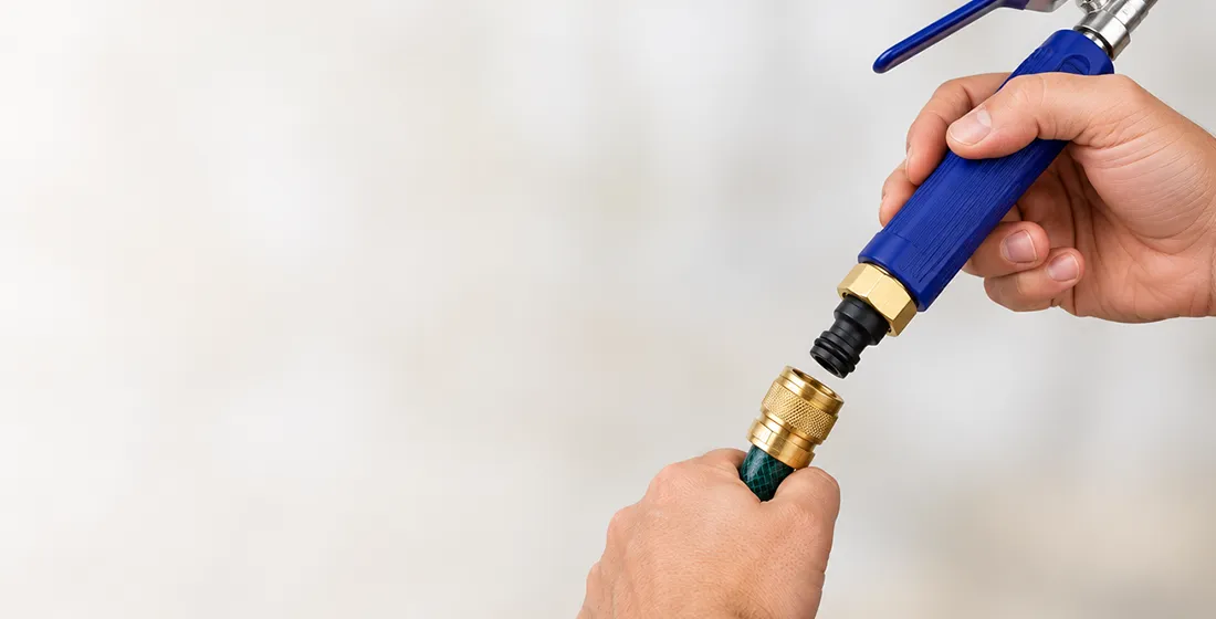 Close-up of a hose wand connection